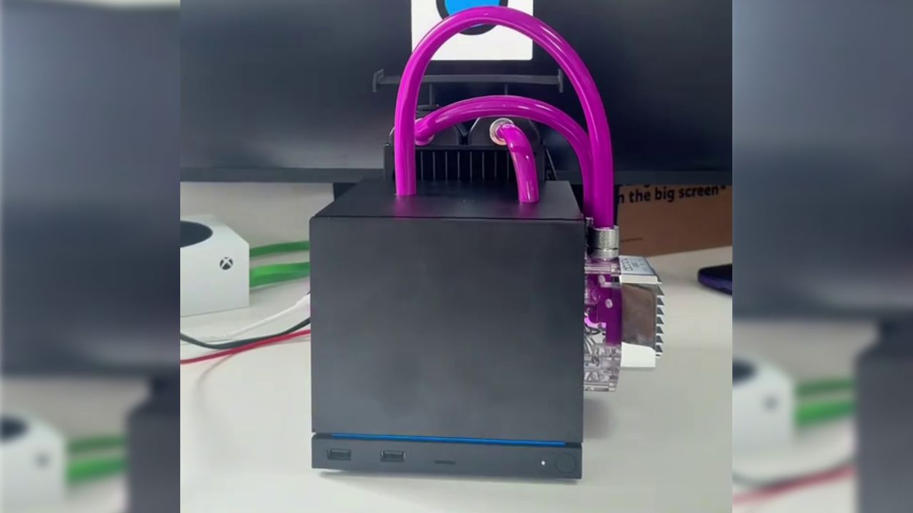 The 'world's first' water-cooled Steam Machine is a Frankenstein's monster of neon pink tubing and external hardware